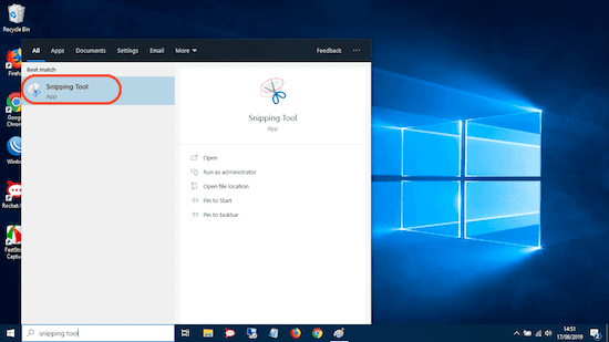 Membuka aplikasi Snipping Tool bawaan Windows untuk screenshot